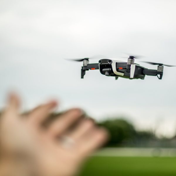 hand-reaching-out-to-drone_4460x4460