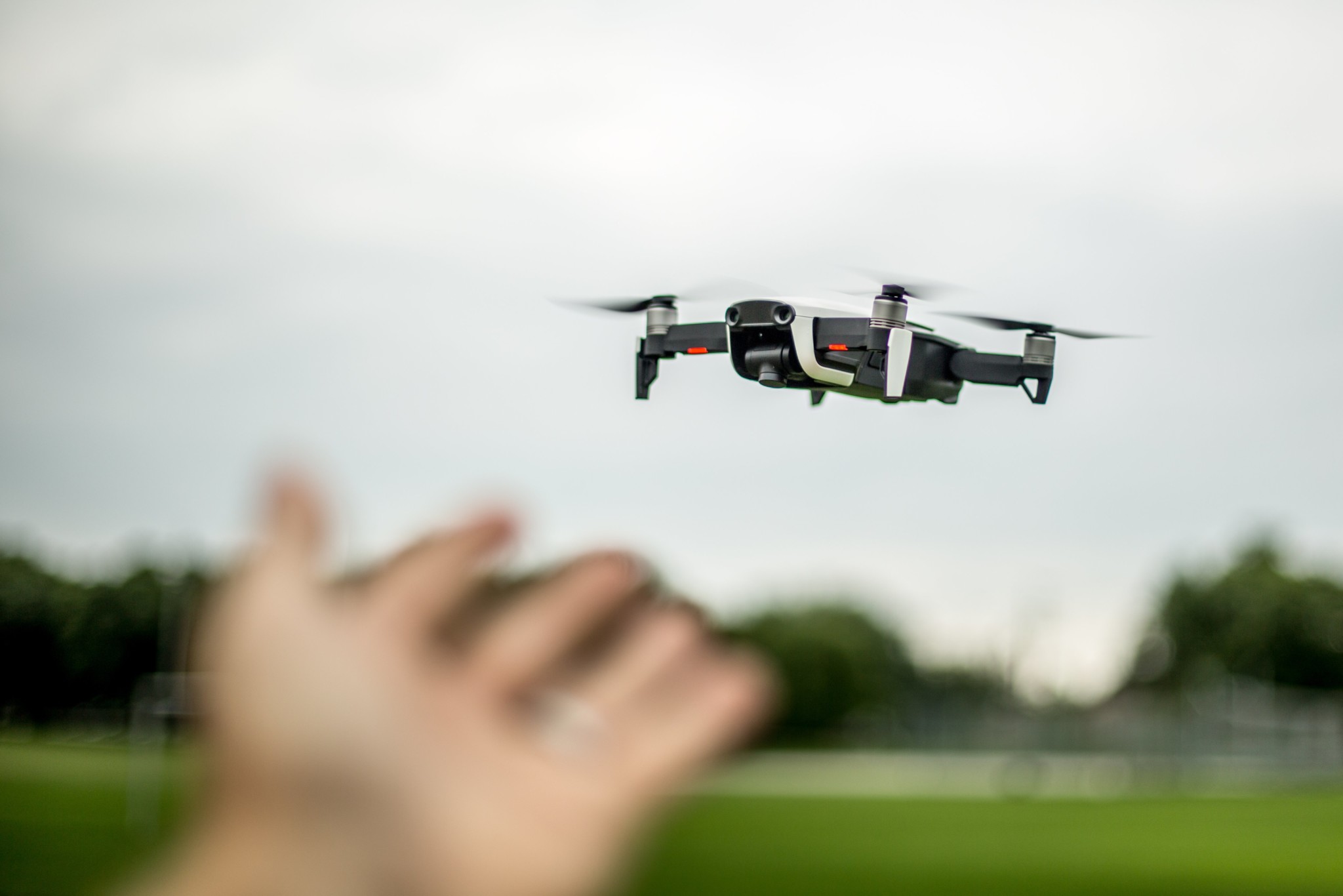 hand-reaching-out-to-drone_4460x4460